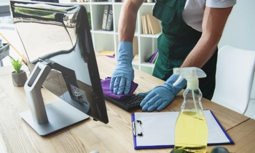 A person cleaning an office