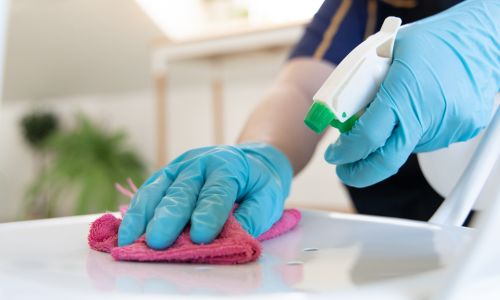 A person cleaning thoroughly